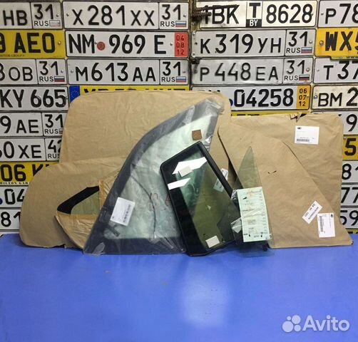 Стекло боковое опускное для Mazda левый руль