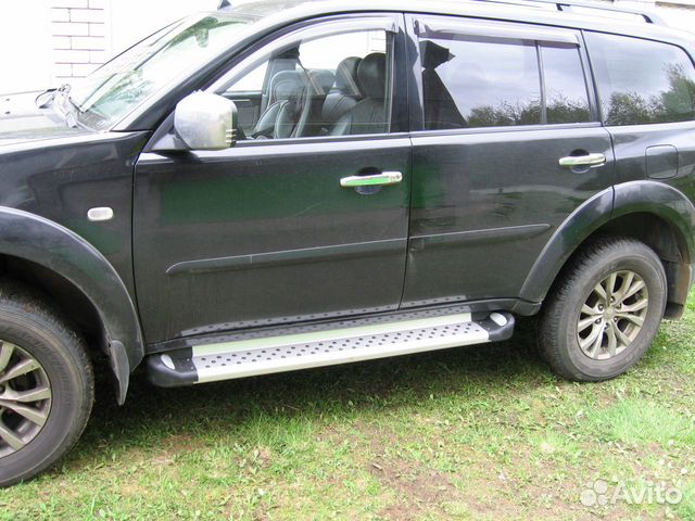 Пороги на Mitsubishi Pajero Sport 2 BMW Style