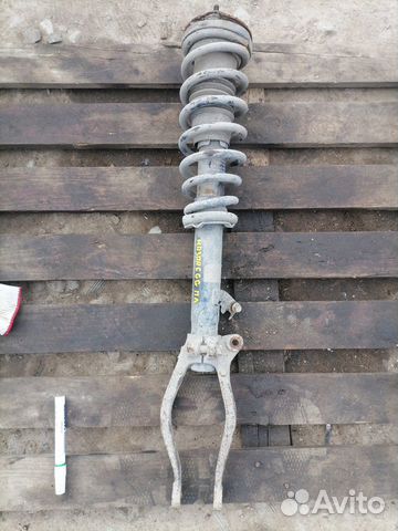 Стойка передняя левая Mazda 6GG 2.0