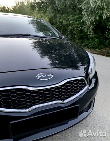 Наклейки на эмблемы Kia (белые)