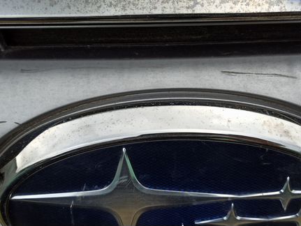 Эмблема решётка радиатор Subaru Legacy Outback B15