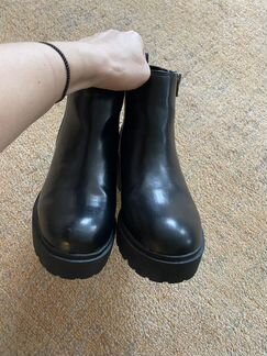 Новые кожаные ботинки