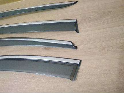 Дефлекторы Mitsubishi L200 нержавеющий молдинг